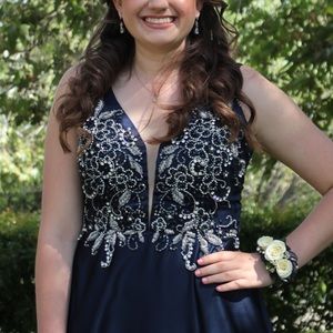 Navy blue satin prom dress with beaded bodice